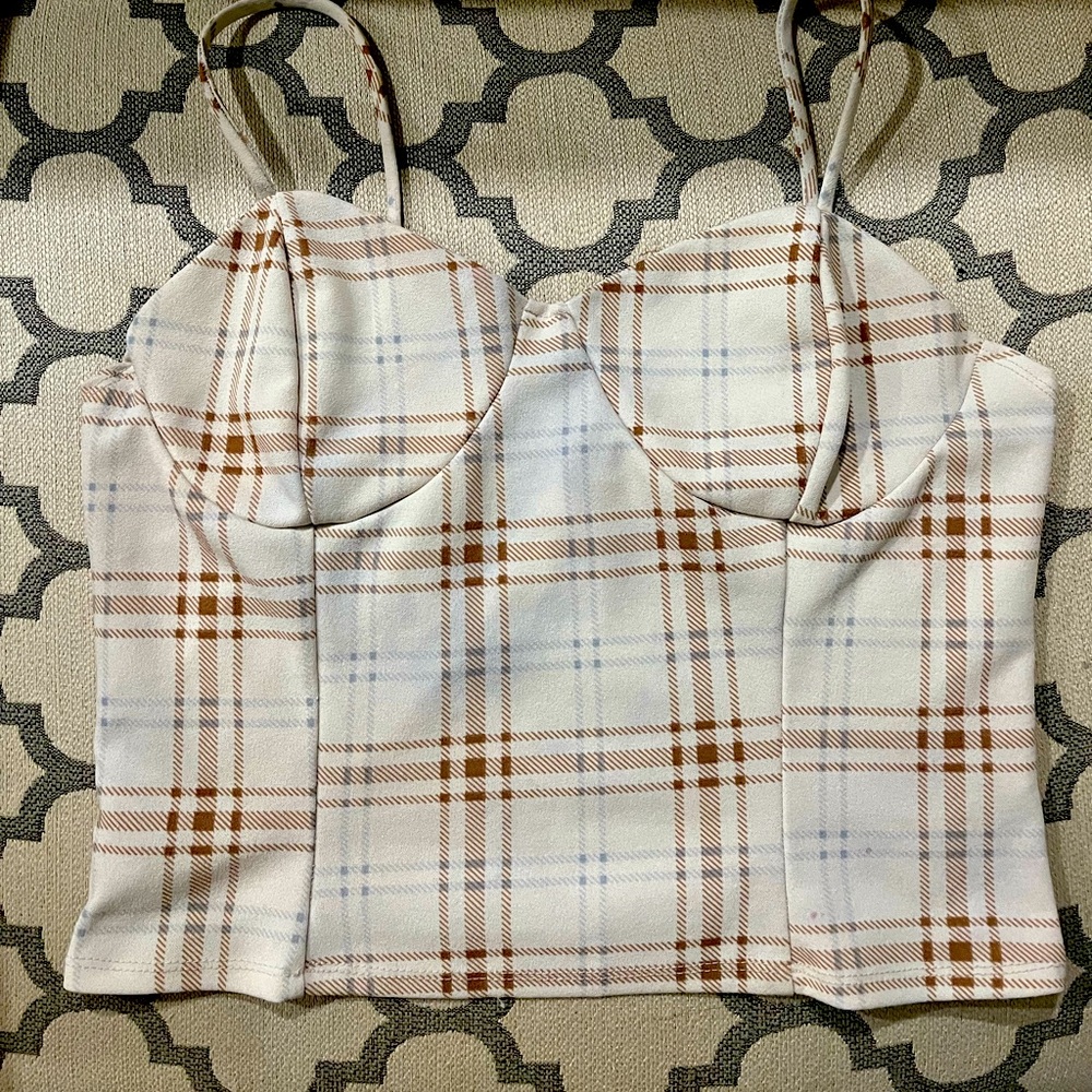 This pink striped crop top is cute and casual. It is good for the springtime.